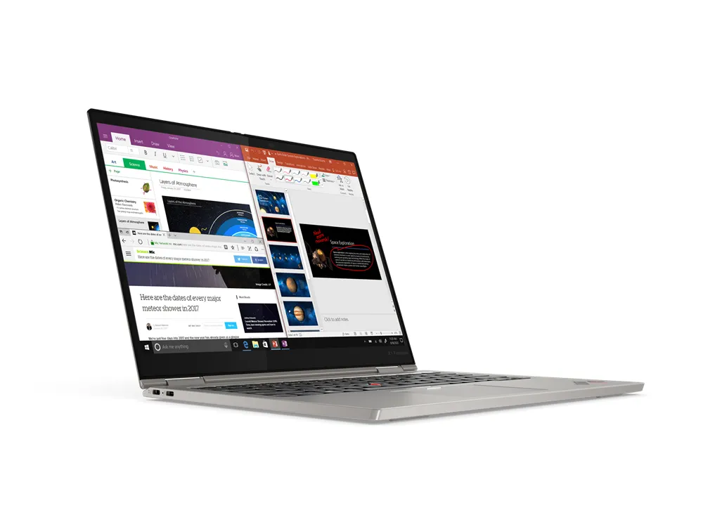 Schlanker silberner Laptop mit mehreren geöffneten Office-Anwendungen auf dem Bildschirm